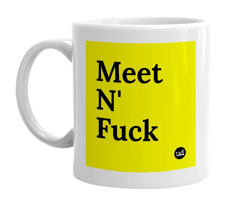 White mug with 'Meet N' Fuck' in bold black letters