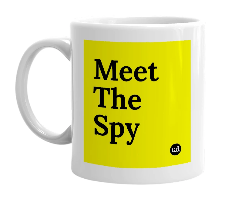 White mug with 'Meet The Spy' in bold black letters