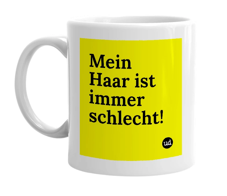 White mug with 'Mein Haar ist immer schlecht!' in bold black letters