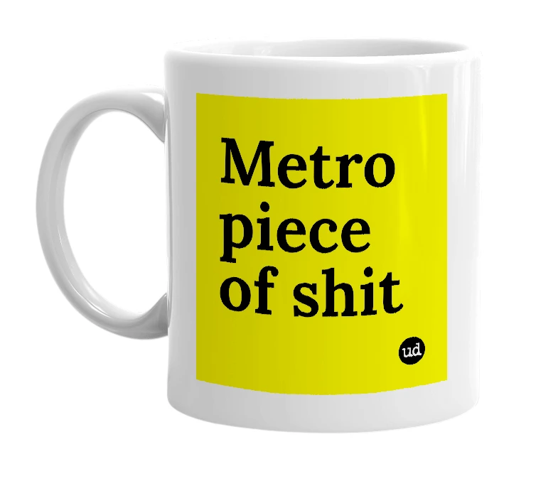 White mug with 'Metro piece of shit' in bold black letters