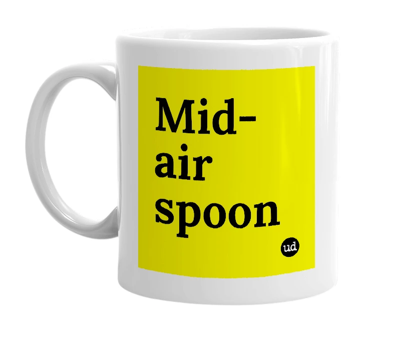 White mug with 'Mid-air spoon' in bold black letters