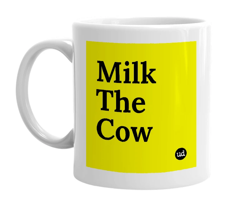 White mug with 'Milk The Cow' in bold black letters