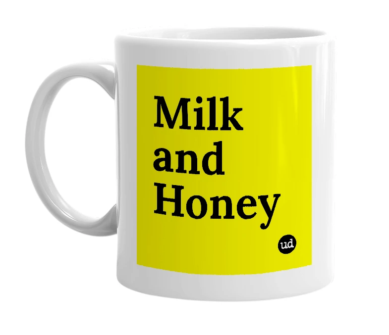 White mug with 'Milk and Honey' in bold black letters