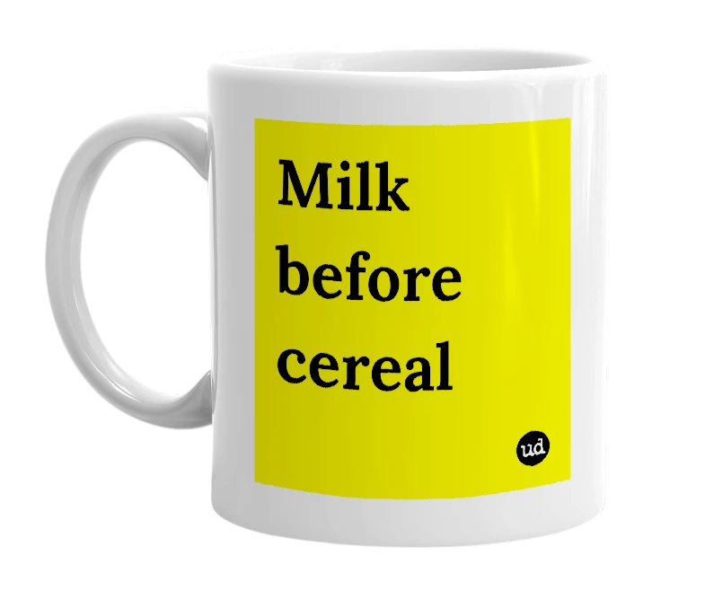 White mug with 'Milk before cereal' in bold black letters