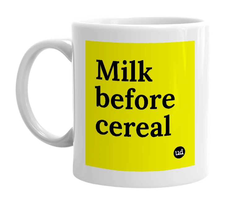 White mug with 'Milk before cereal' in bold black letters