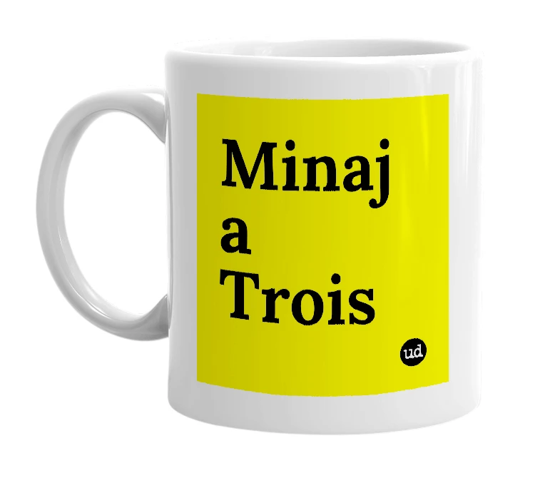 White mug with 'Minaj a Trois' in bold black letters