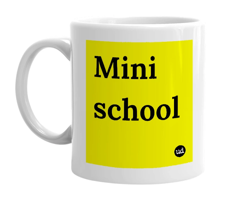 White mug with 'Mini school' in bold black letters