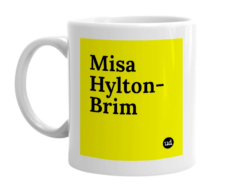 White mug with 'Misa Hylton-Brim' in bold black letters