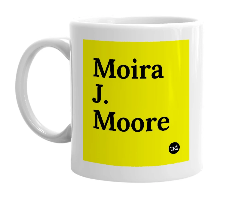 White mug with 'Moira J. Moore' in bold black letters