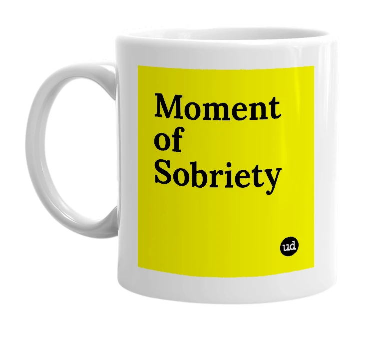 White mug with 'Moment of Sobriety' in bold black letters