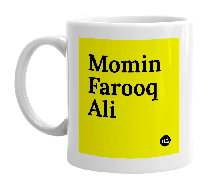 White mug with 'Momin Farooq Ali' in bold black letters