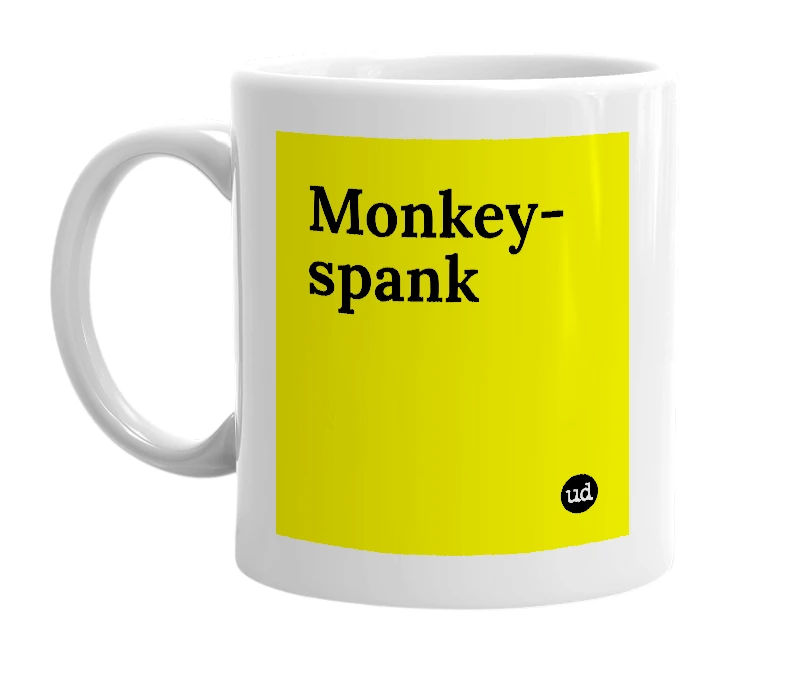 White mug with 'Monkey-spank' in bold black letters