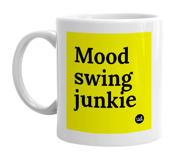 White mug with 'Mood swing junkie' in bold black letters