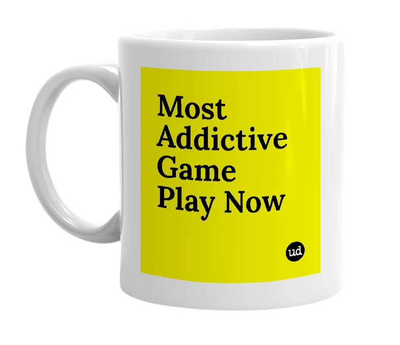 White mug with 'Most Addictive Game Play Now' in bold black letters