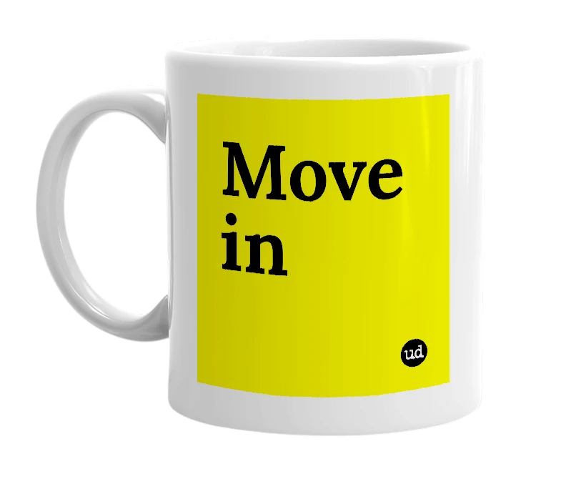 White mug with 'Move in' in bold black letters