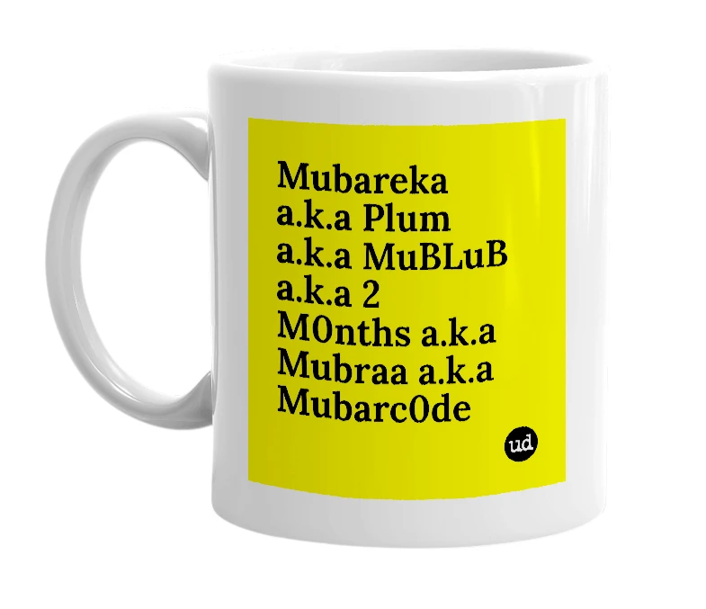 White mug with 'Mubareka a.k.a Plum a.k.a MuBLuB a.k.a 2 M0nths a.k.a Mubraa a.k.a Mubarc0de' in bold black letters