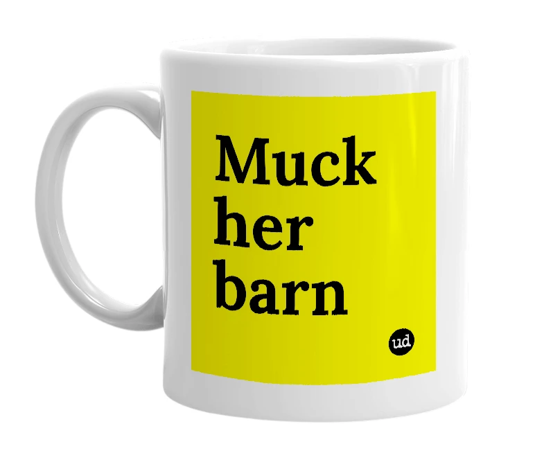 White mug with 'Muck her barn' in bold black letters