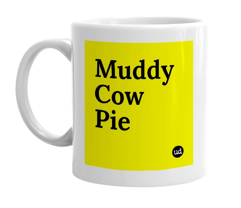 White mug with 'Muddy Cow Pie' in bold black letters