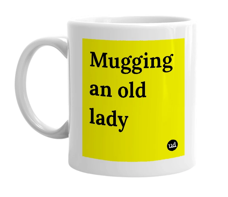 White mug with 'Mugging an old lady' in bold black letters