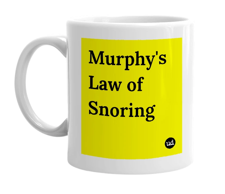 White mug with 'Murphy's Law of Snoring' in bold black letters