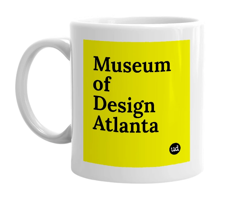 White mug with 'Museum of Design Atlanta' in bold black letters
