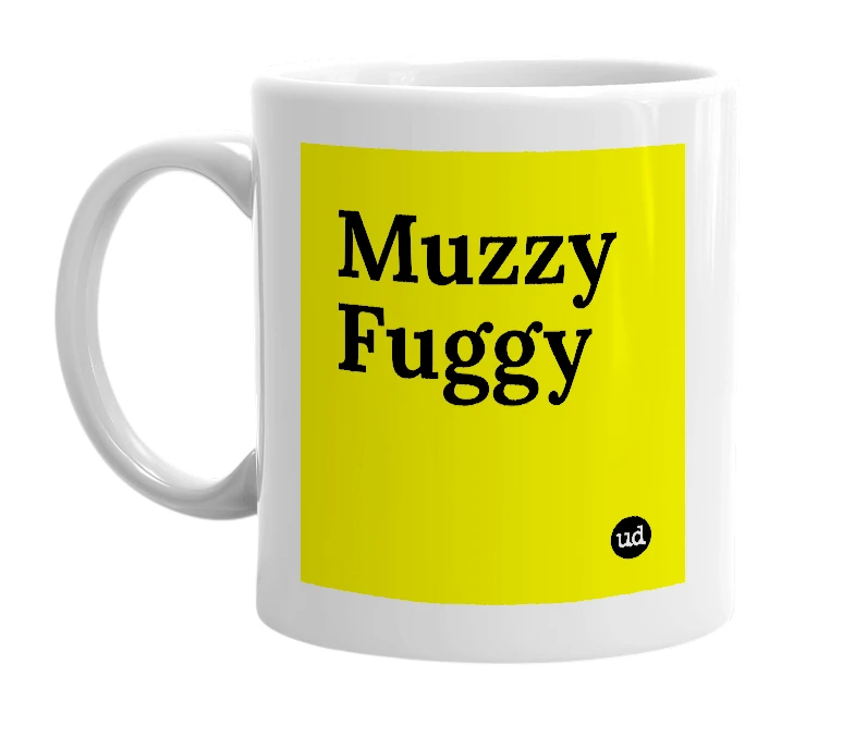 White mug with 'Muzzy Fuggy' in bold black letters