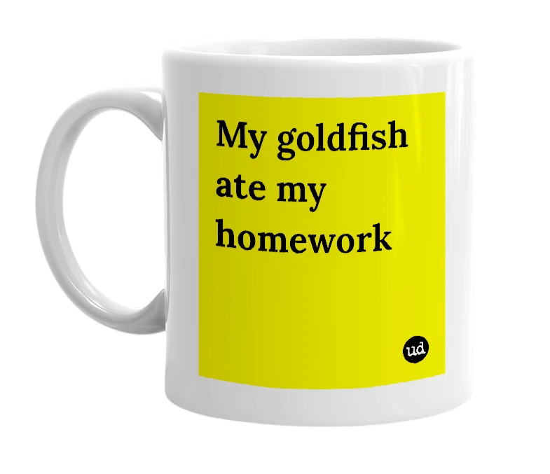 White mug with 'My goldfish ate my homework' in bold black letters