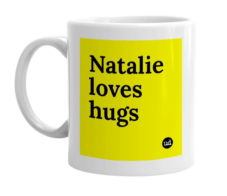 White mug with 'Natalie loves hugs' in bold black letters