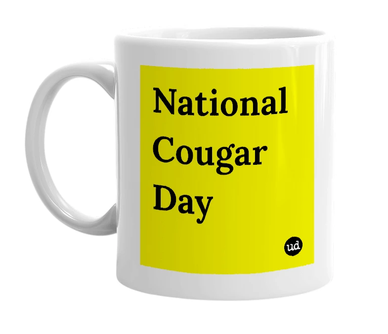 White mug with 'National Cougar Day' in bold black letters