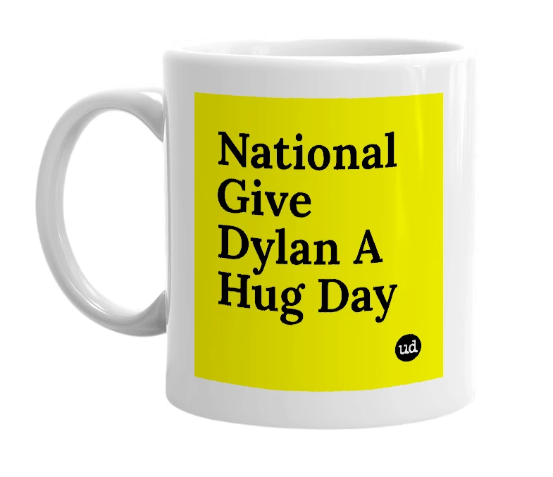 White mug with 'National Give Dylan A Hug Day' in bold black letters