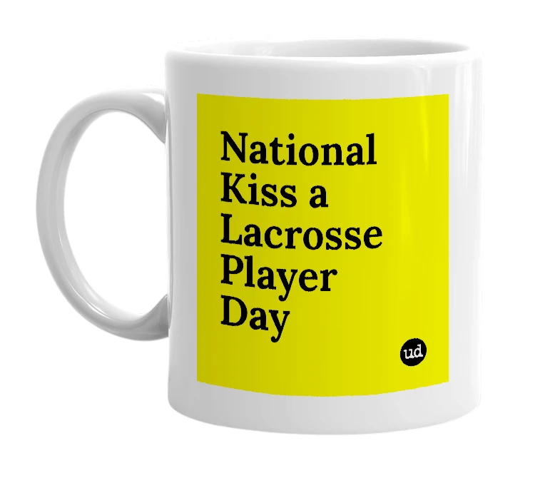 White mug with 'National Kiss a Lacrosse Player Day' in bold black letters