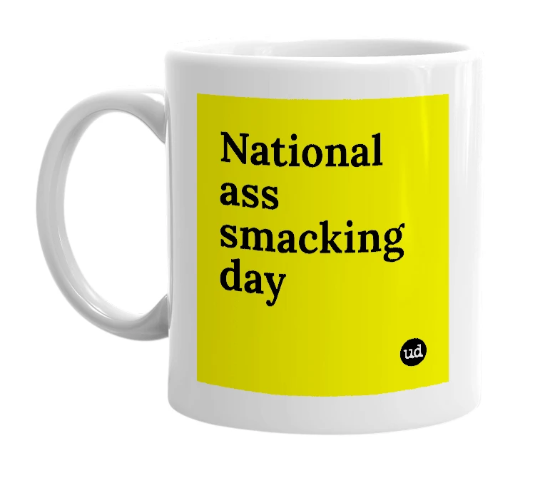 White mug with 'National ass smacking day' in bold black letters