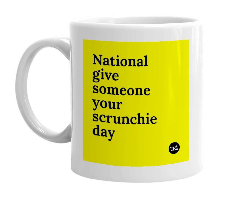 White mug with 'National give someone your scrunchie day' in bold black letters