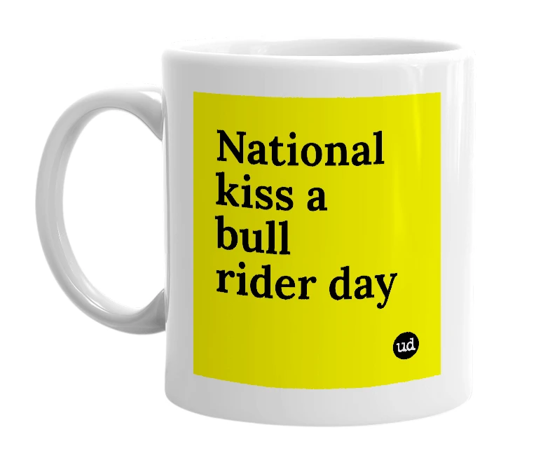 White mug with 'National kiss a bull rider day' in bold black letters