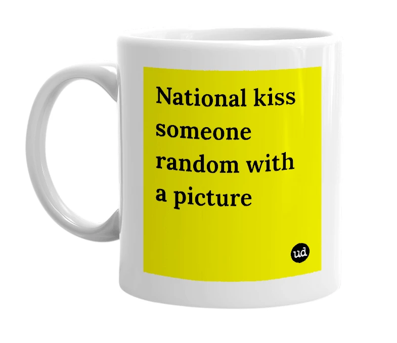 White mug with 'National kiss someone random with a picture' in bold black letters
