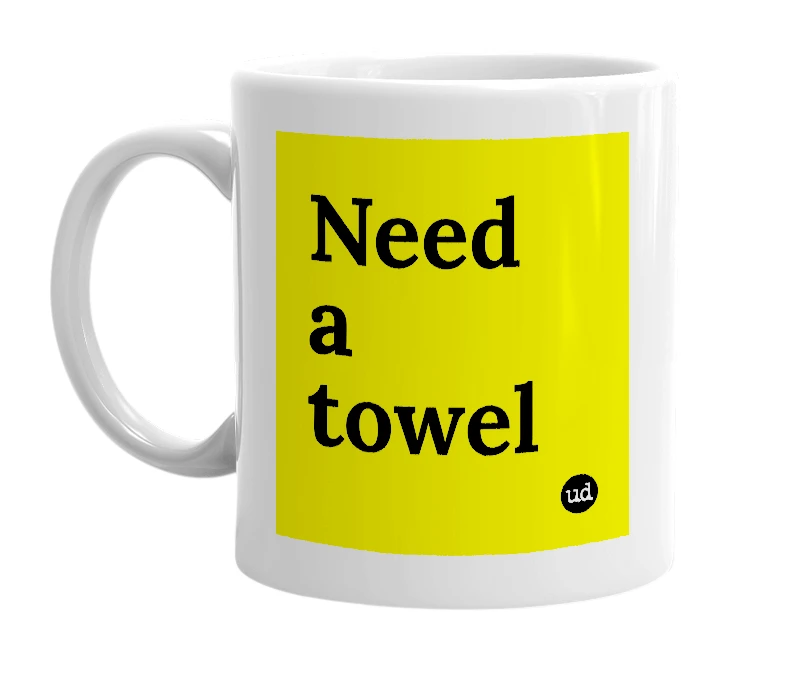 White mug with 'Need a towel' in bold black letters