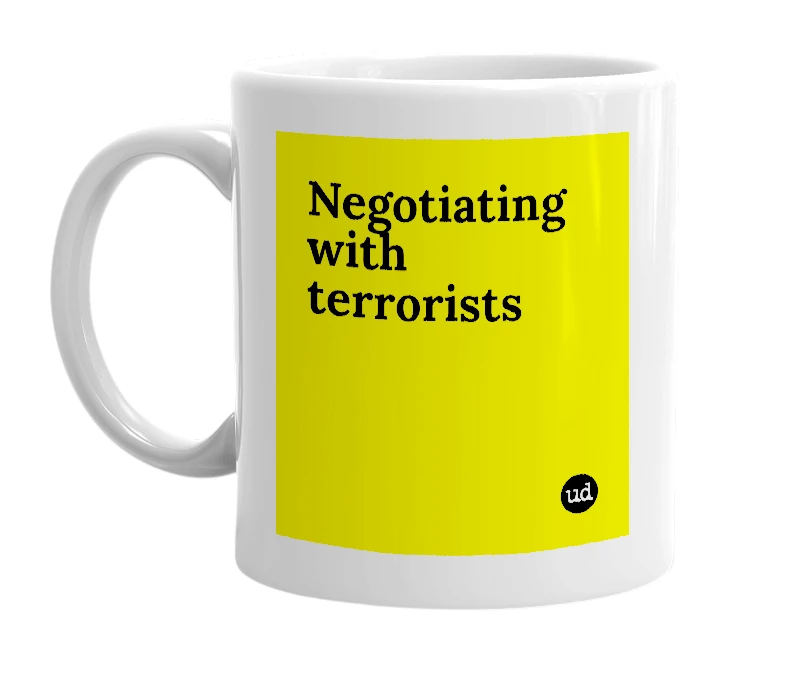 White mug with 'Negotiating with terrorists' in bold black letters