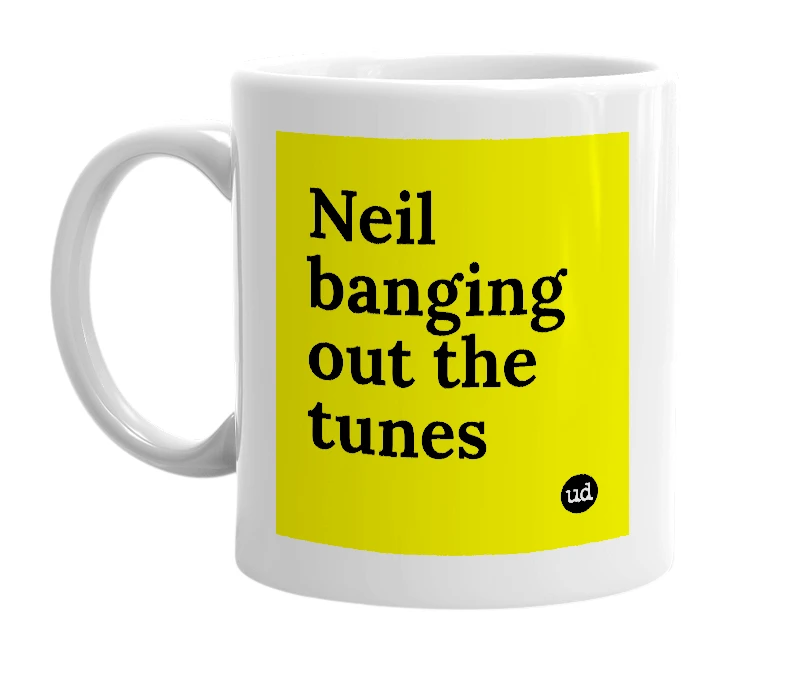 White mug with 'Neil banging out the tunes' in bold black letters