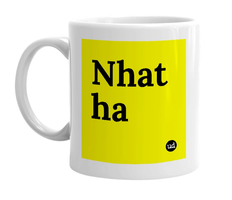 White mug with 'Nhat ha' in bold black letters