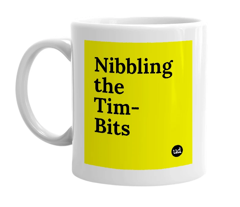 White mug with 'Nibbling the Tim-Bits' in bold black letters