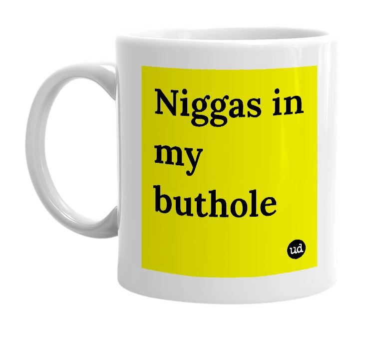 White mug with 'Niggas in my buthole' in bold black letters