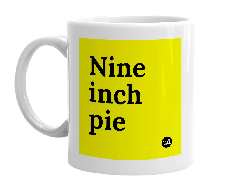 White mug with 'Nine inch pie' in bold black letters