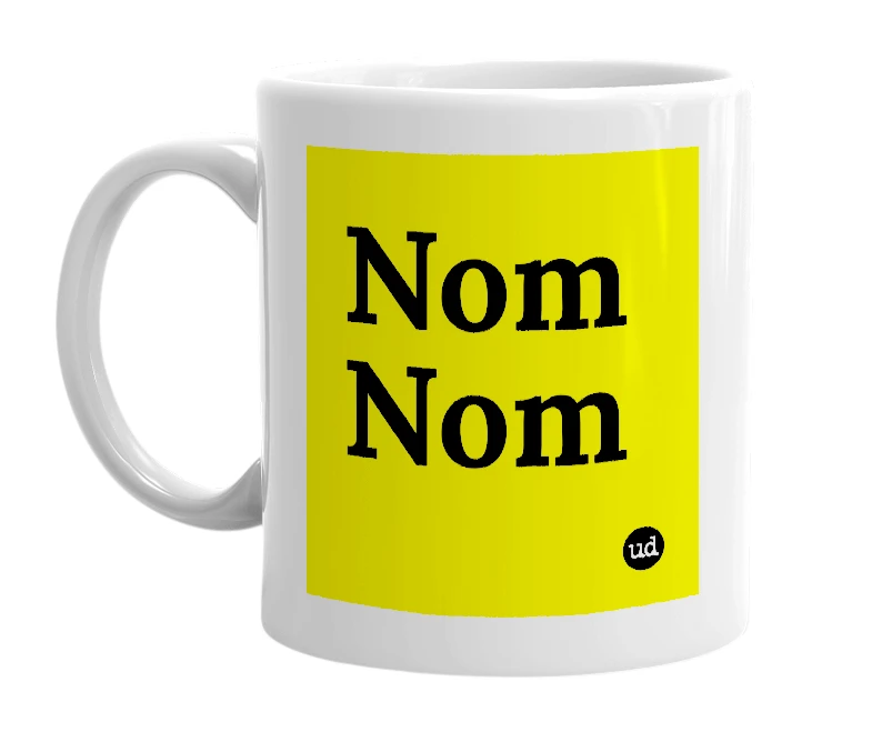 White mug with 'Nom Nom' in bold black letters