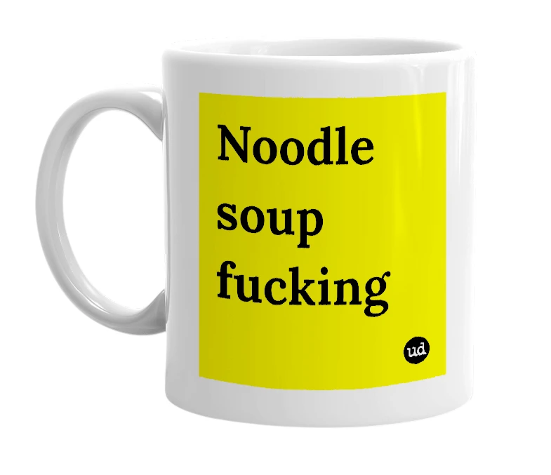 White mug with 'Noodle soup fucking' in bold black letters