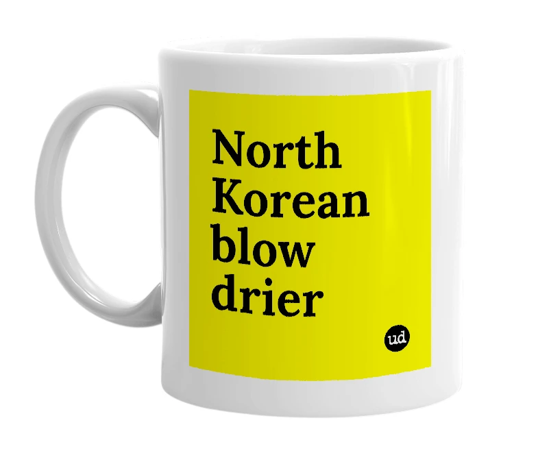 White mug with 'North Korean blow drier' in bold black letters