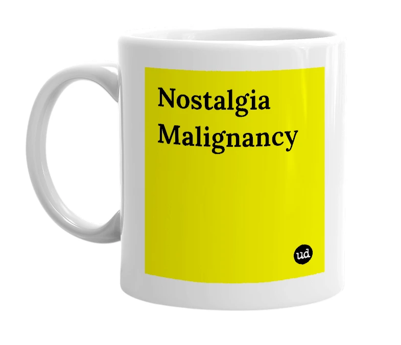 White mug with 'Nostalgia Malignancy' in bold black letters