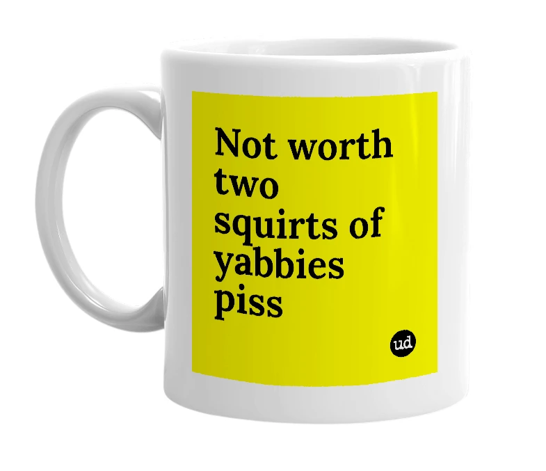 White mug with 'Not worth two squirts of yabbies piss' in bold black letters