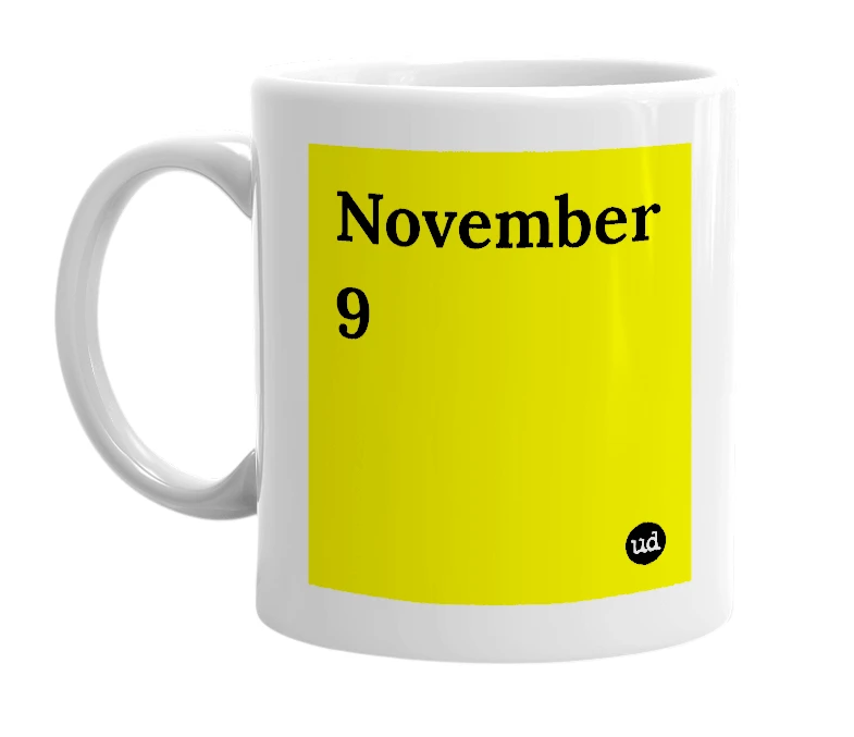 White mug with 'November 9' in bold black letters