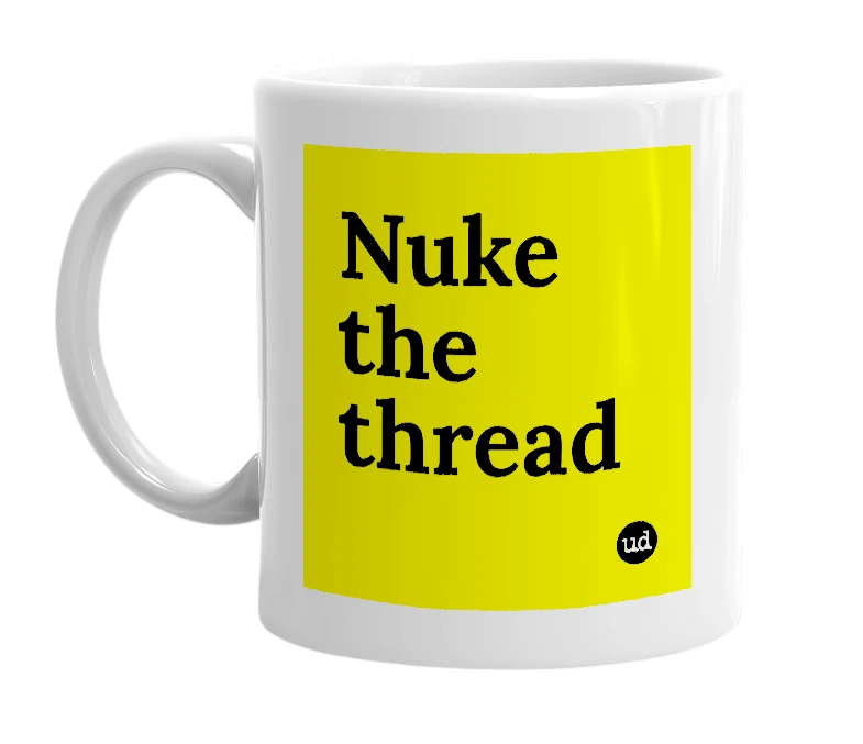 White mug with 'Nuke the thread' in bold black letters