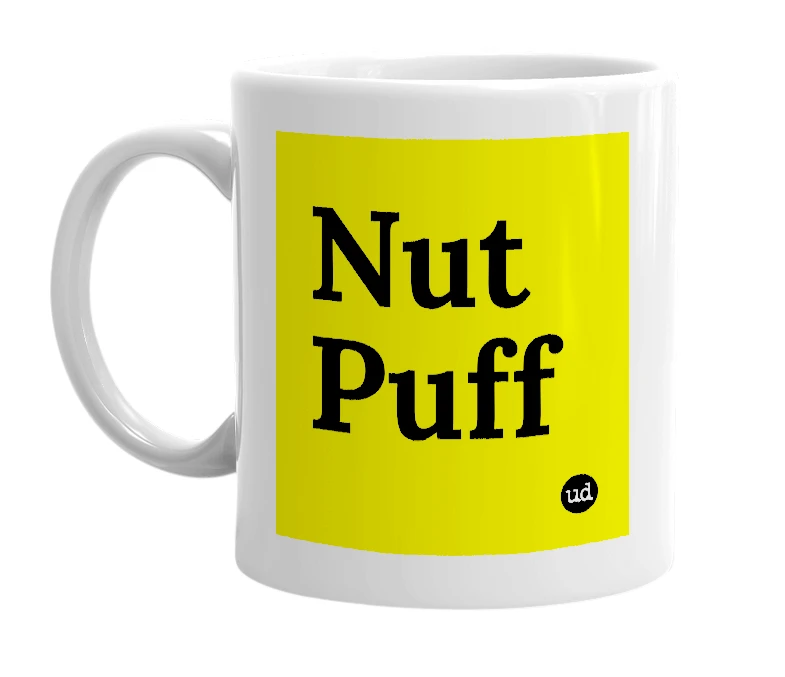 White mug with 'Nut Puff' in bold black letters